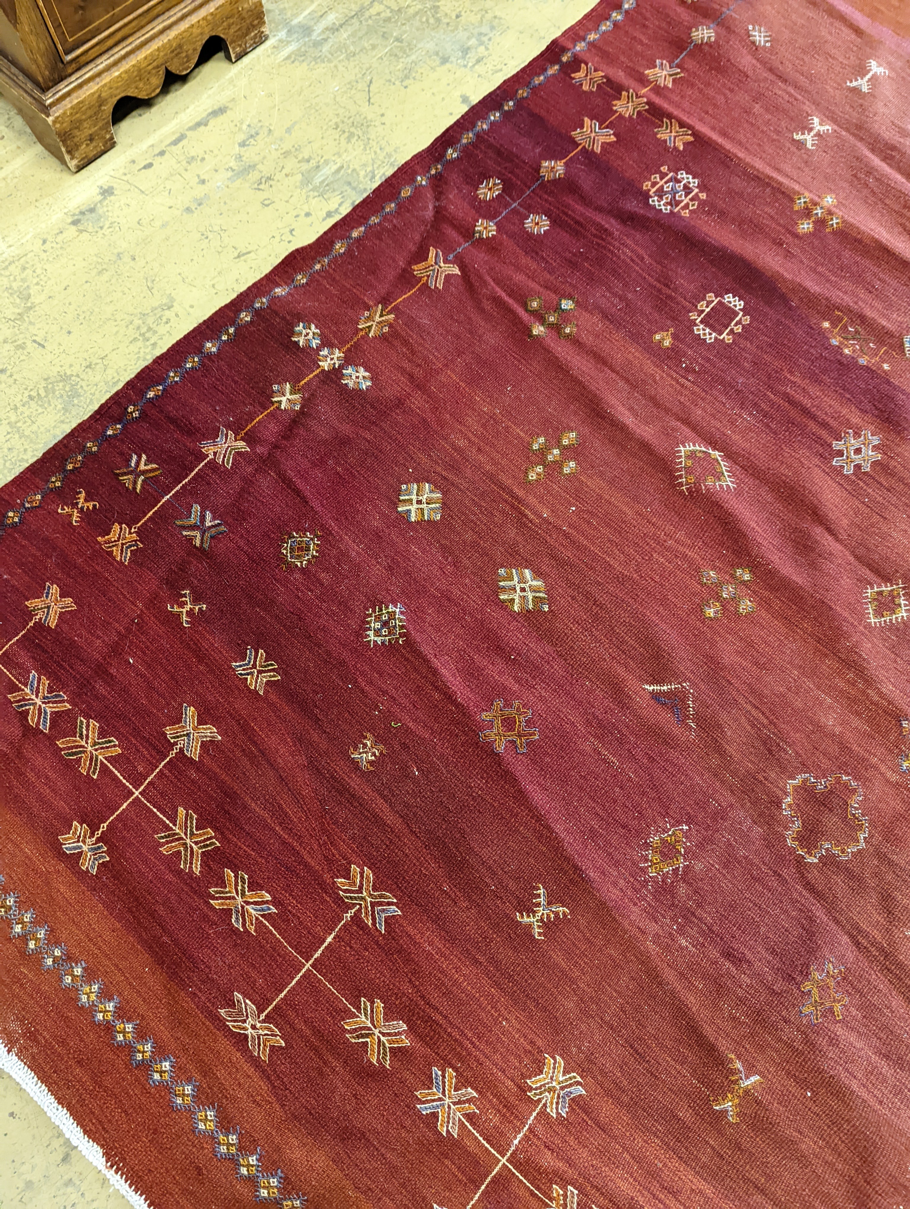 A Gabbah Kelim red ground carpet, 300 x 200cm